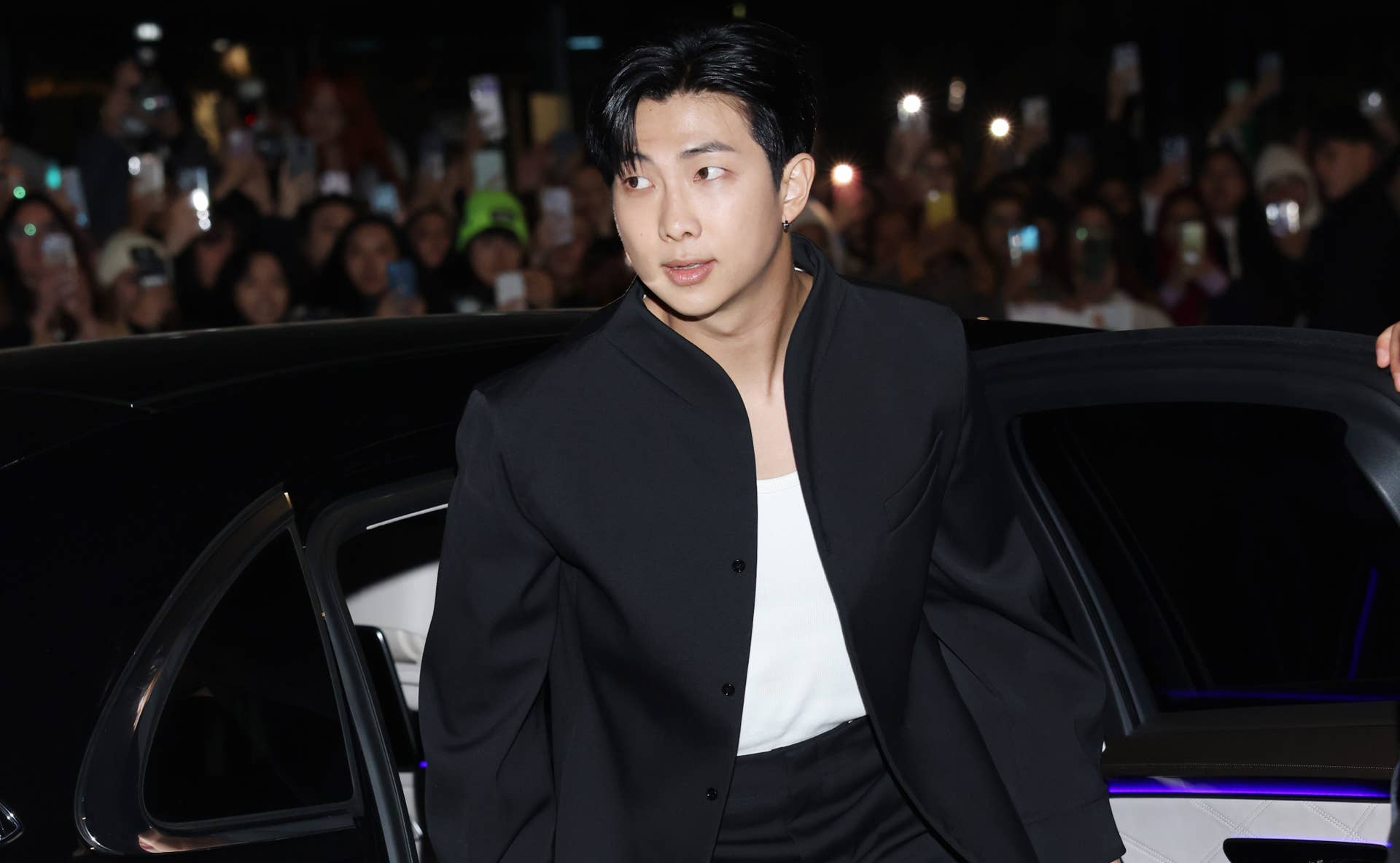 RM Sits Front Row at Bottega Veneta, Sparking Further Speculation That a Brand Deal May Be Coming