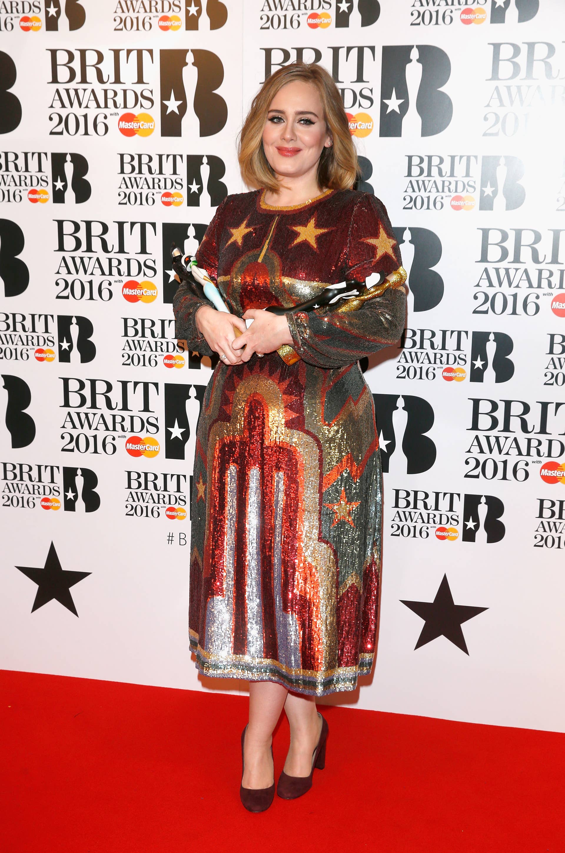 adele red carpet dresses Adele Wears Black Sheer V-Neck Dress at BRIT Awards 2022