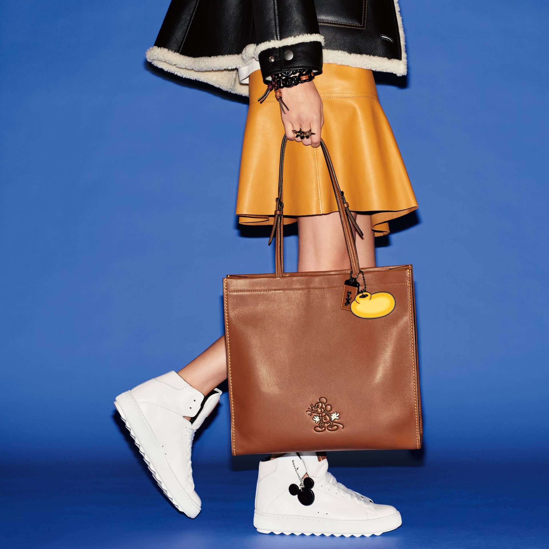 Must Read: Coach Launches Mickey Mouse Collection, Bella Hadid Lands ...