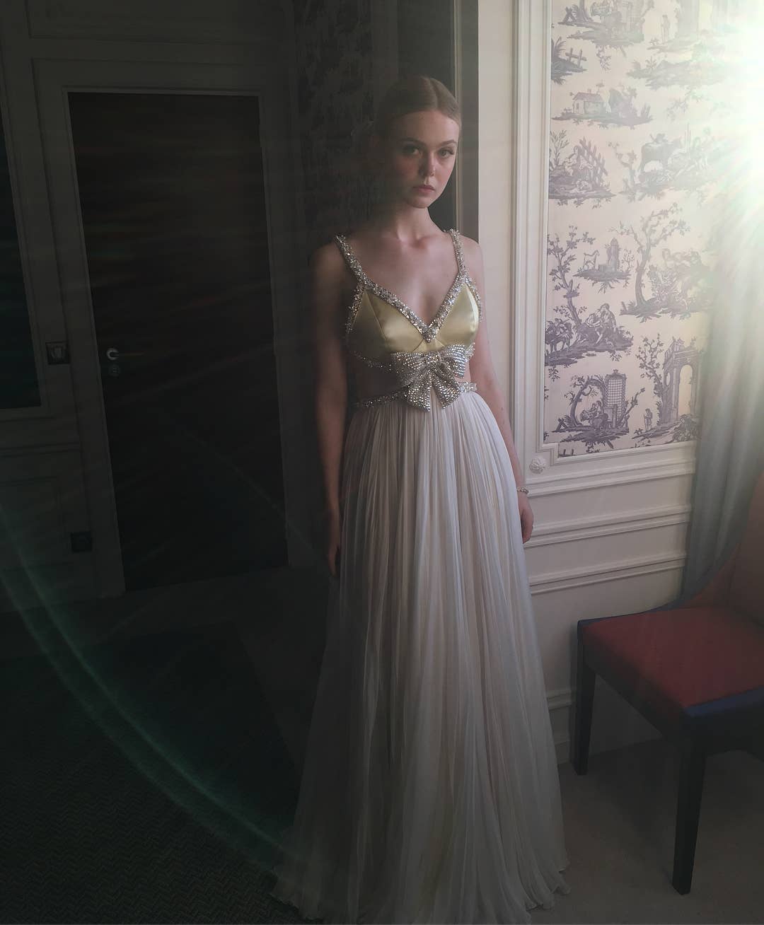 david's bridal gold mother of the bride dress Elle Fanning 2025 Vanity Fair Party Black Lace Strapless Gown main image 0