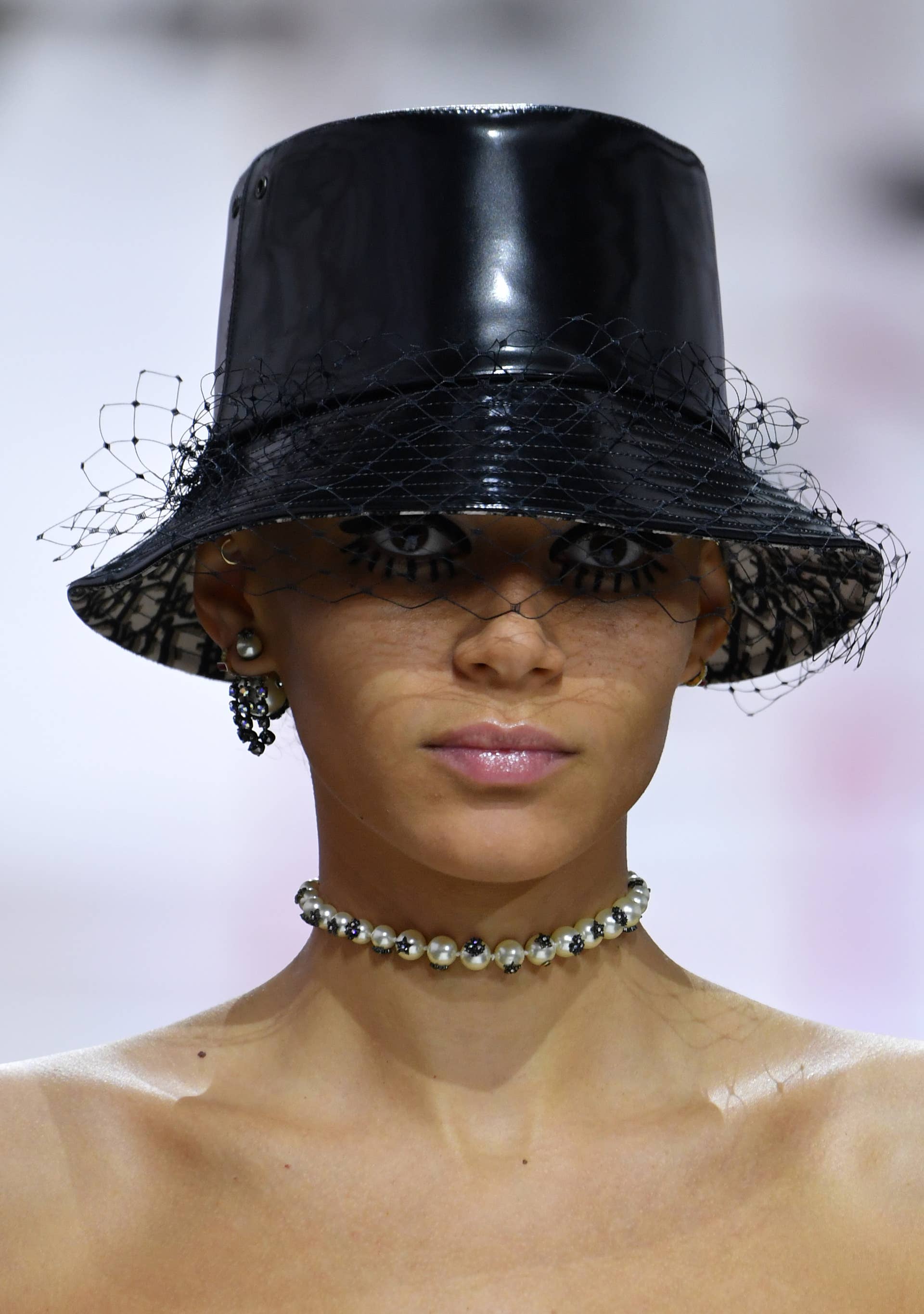 Dior Shows Its Own Version of Hat Hair and Doll Lashes for Fall