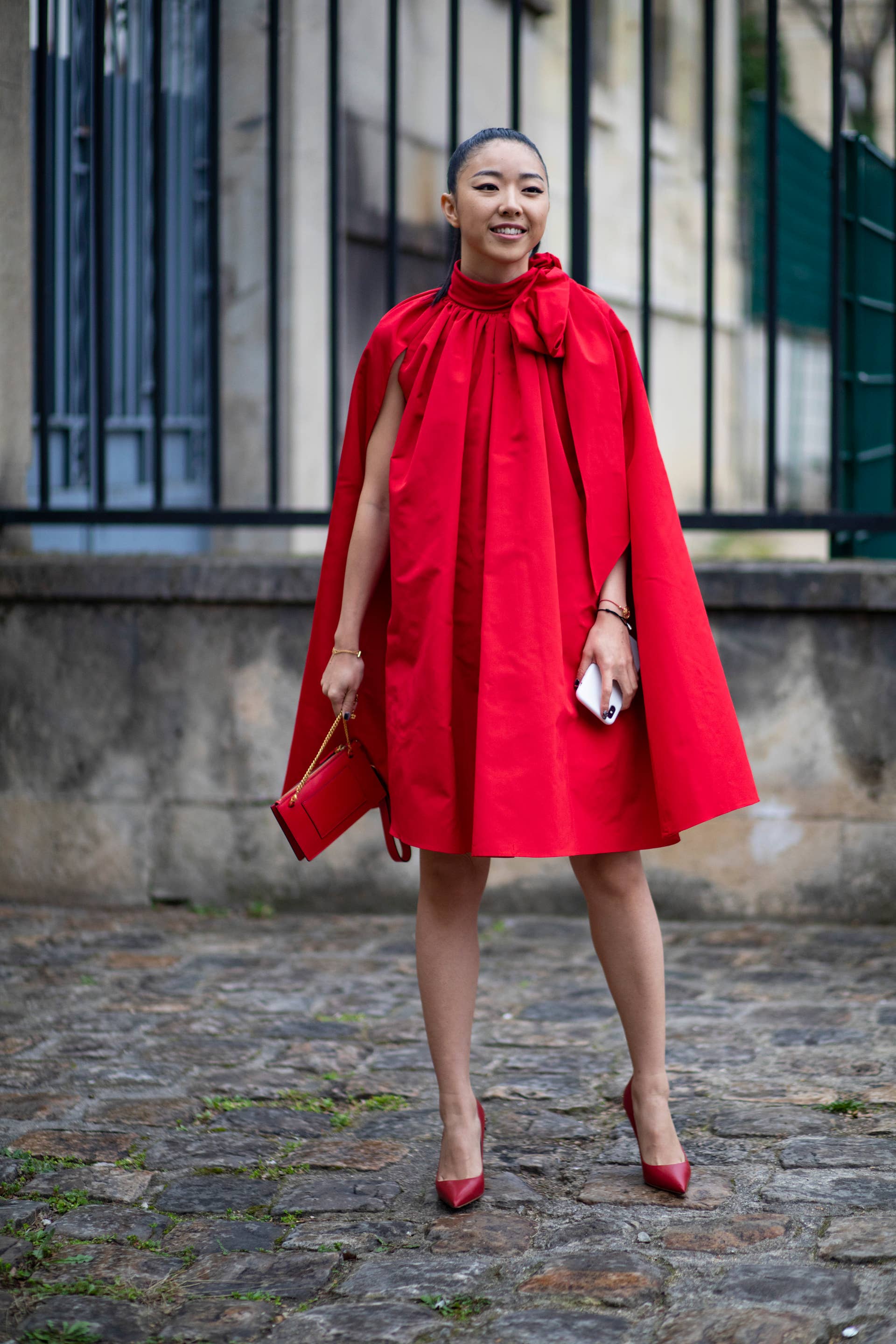 red dress paris fashion week Alana Hadid Frees the Nipple in Sheer Red Silk on Paris Fashion Week Runway