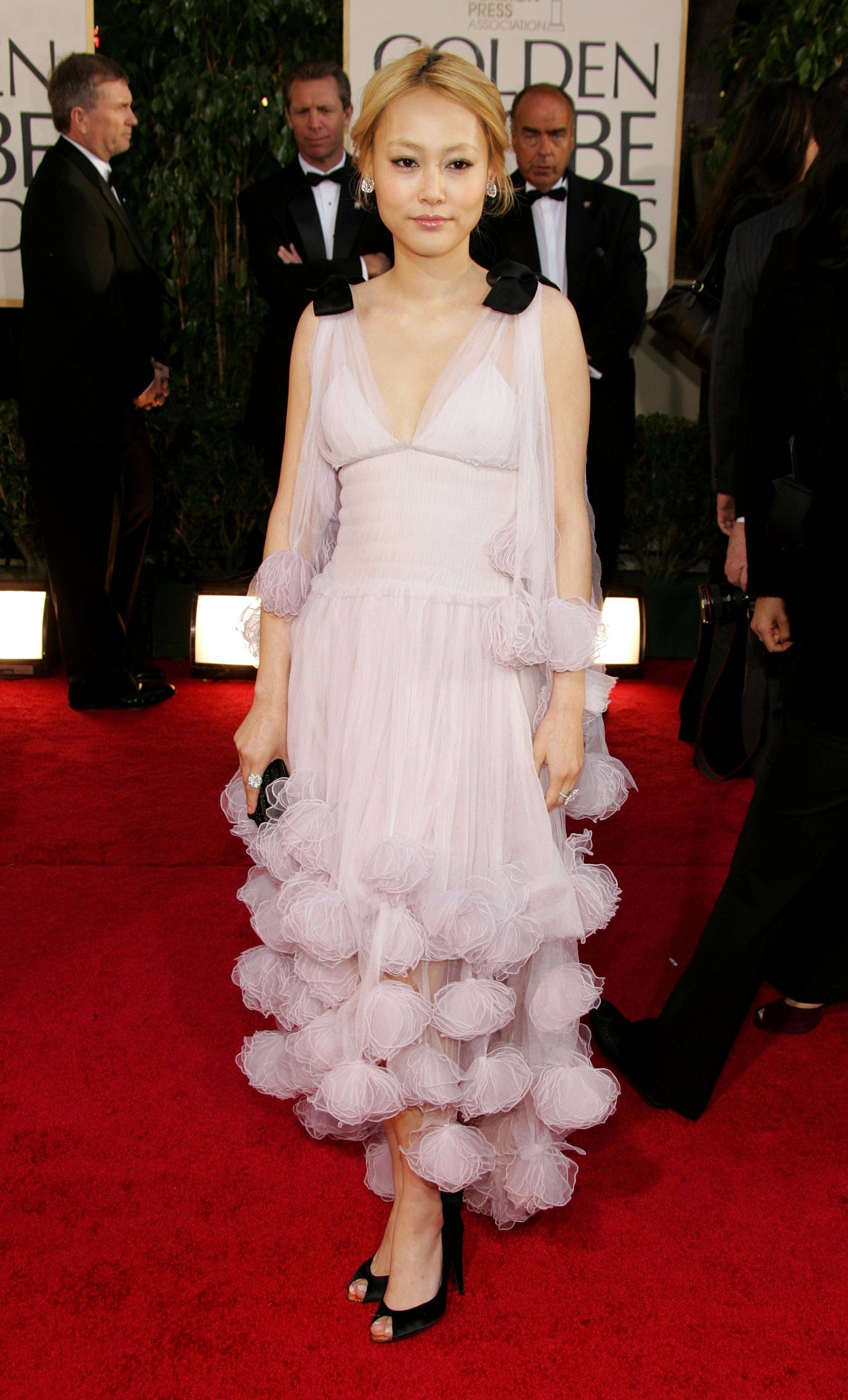 sachin and babi light blue dress Great Outfits in Fashion History: Rinko Kikuchi in Elegant Chanel Pompoms