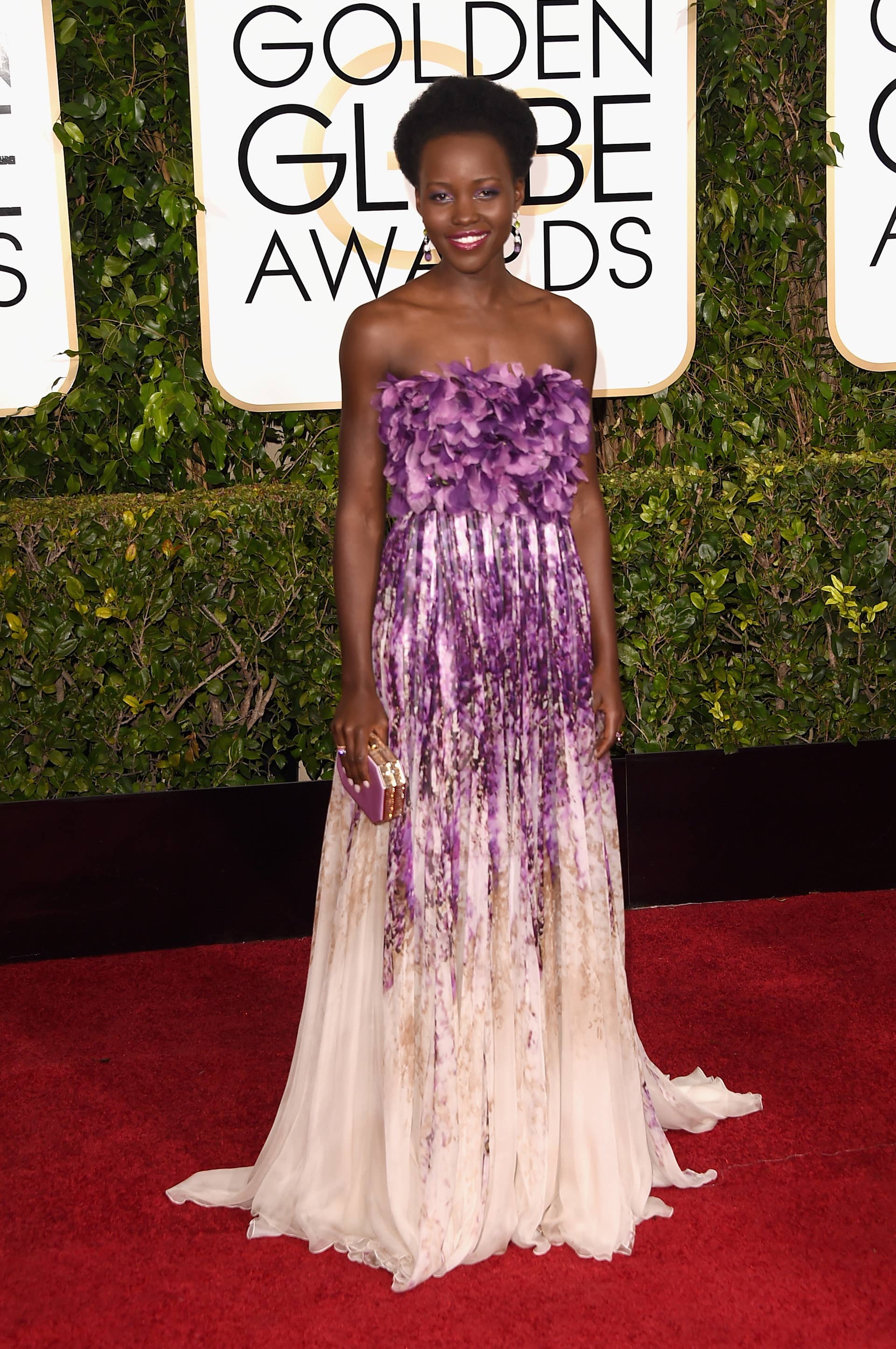 lupita nyong'o purple dress Lupita Nyong'o wears a pretty purple dress for NAACP's Act-So award  ceremony where she surprised 40 students with education scholarships # LupitaNyongo Photos: Getty