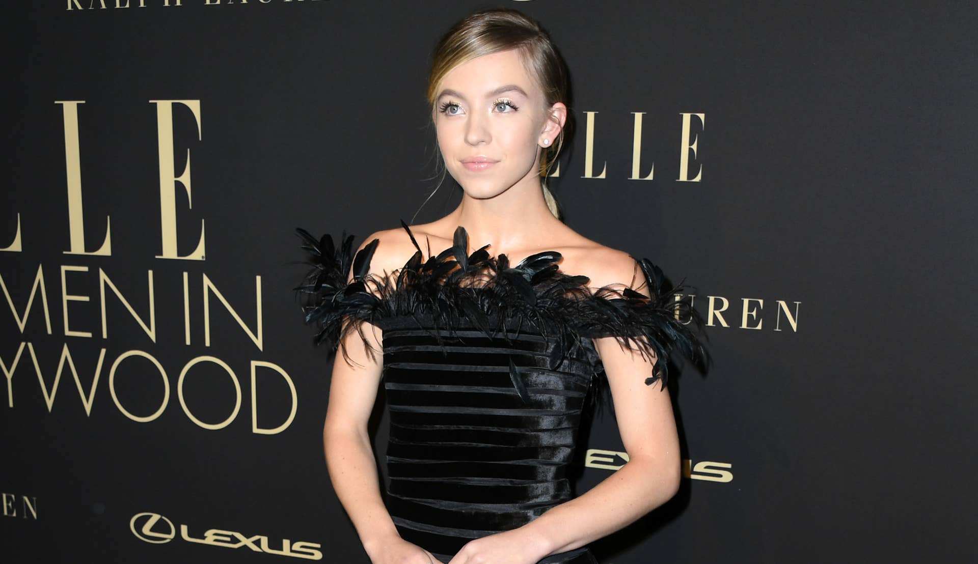 Great Outfits in Fashion History: Sydney Sweeney in a Feathered Black Mini  Dress - Fashionista