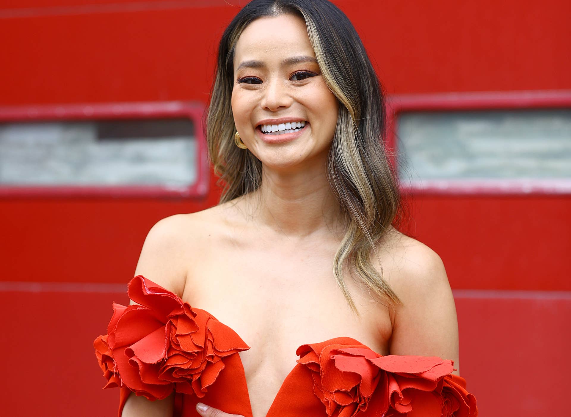 jamie chung orange dress Jamie Chung Explains Powerful Meaning Behind SAG Awards Look