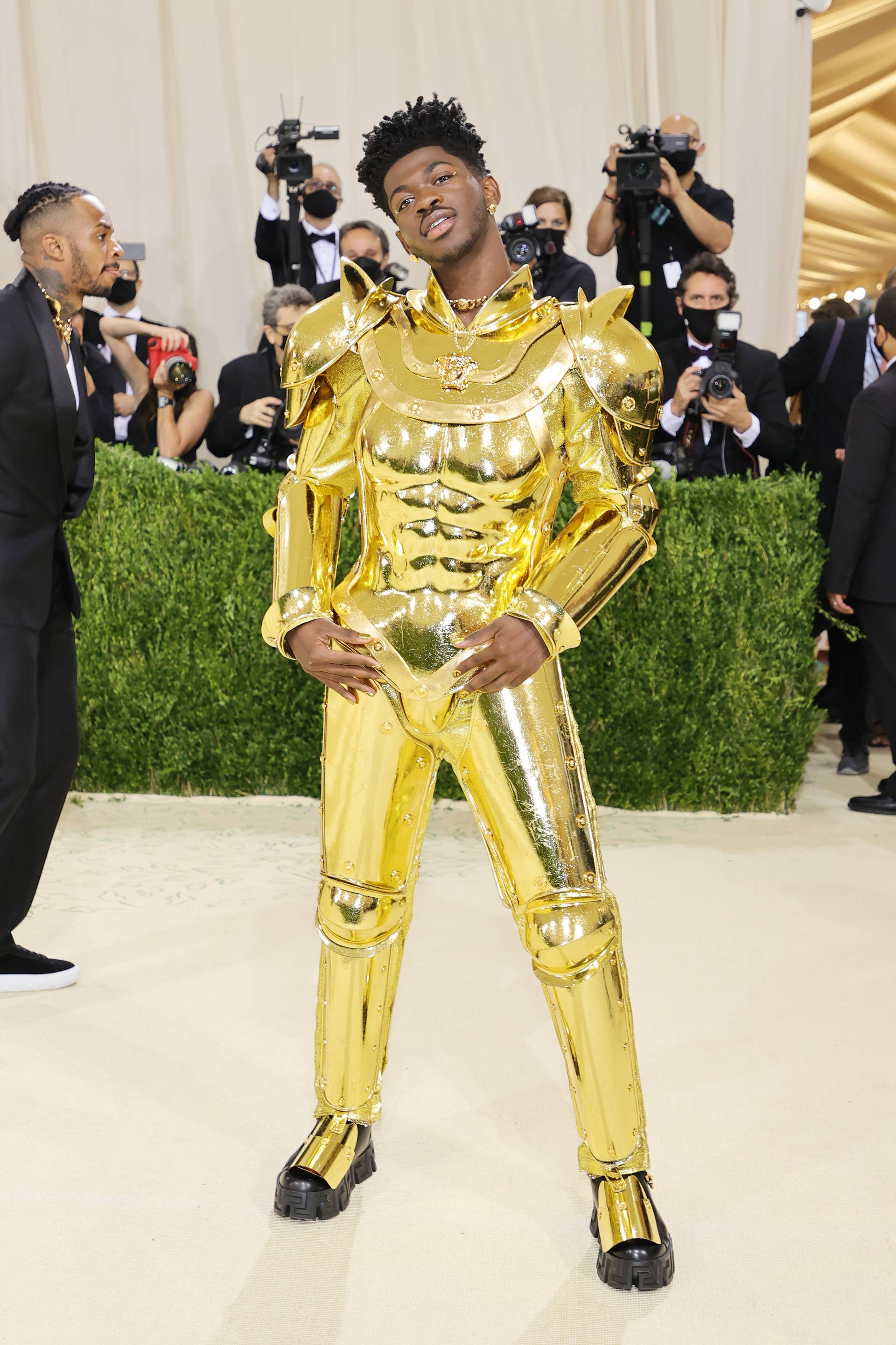 lil nas x gold dress Lil Nas X wears three gold outfits on Met Gala 2021 red carpet