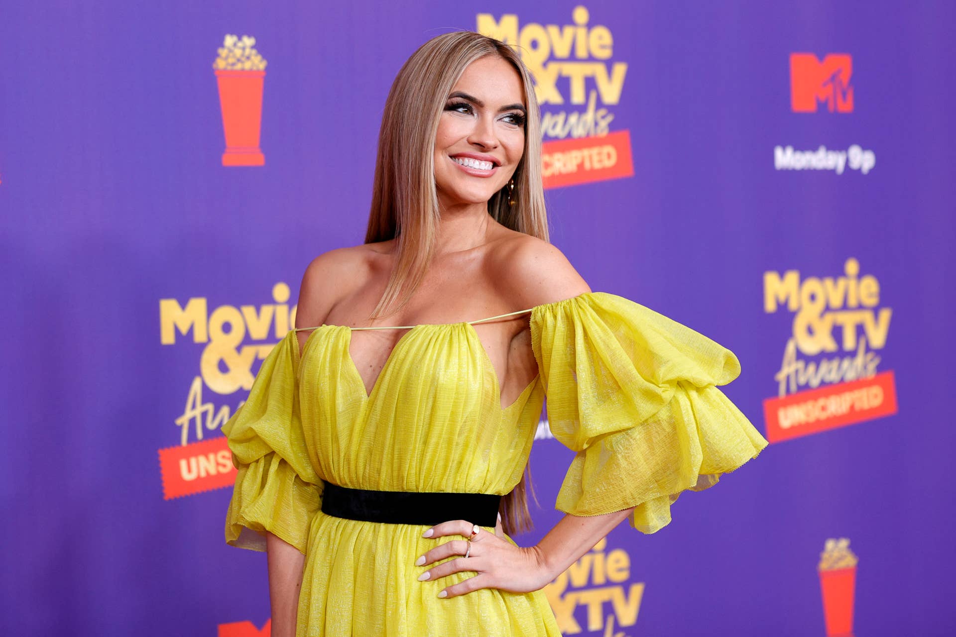 chrishell purple martini dress Selling Sunset's Chrishell Stause shows off her toned figure in a purple  leather dress as Mary Fitzgerald holds her adorable pups while arriving to  set