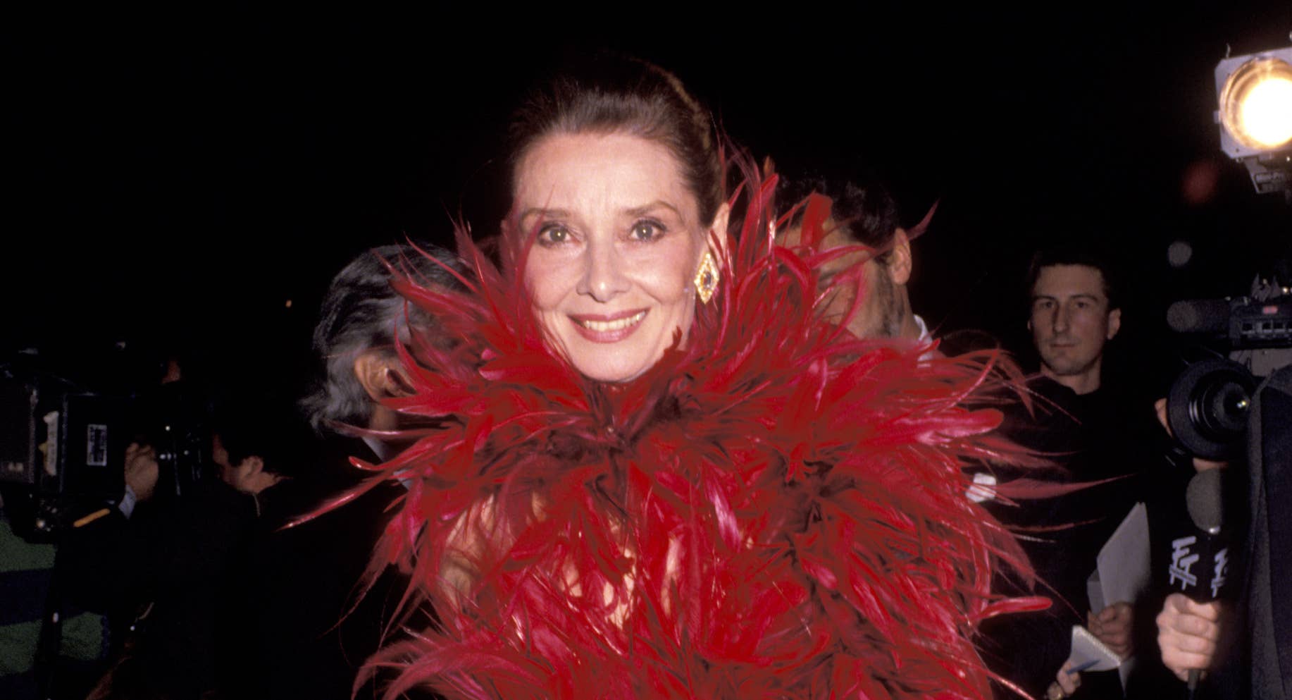 Great Outfits in Fashion History: Audrey Hepburn's 1988 Red Feathered  Givenchy Dress - Fashionista