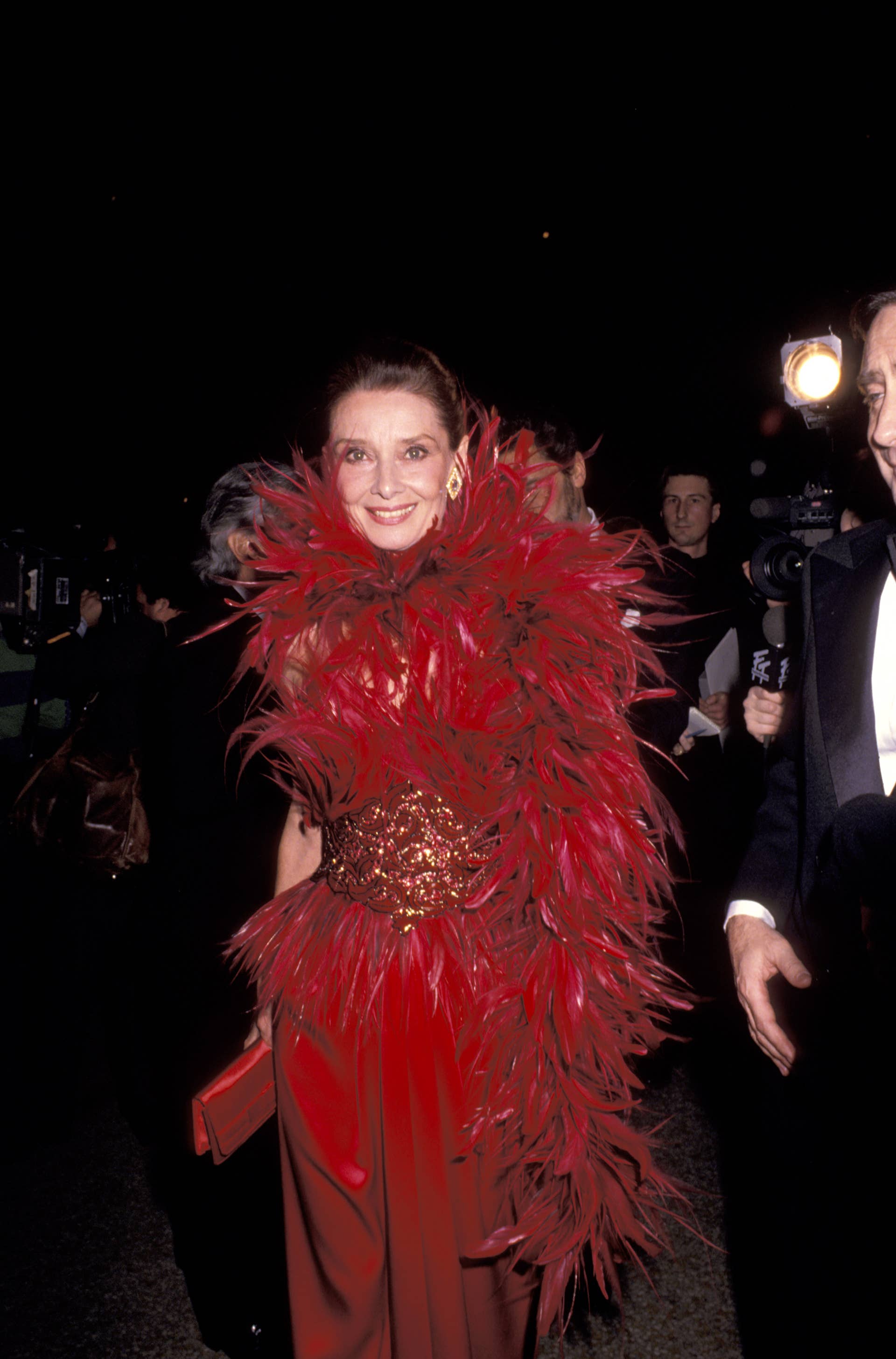Great Outfits in Fashion History: Audrey Hepburn's 1988 Red Feathered  Givenchy Dress - Fashionista