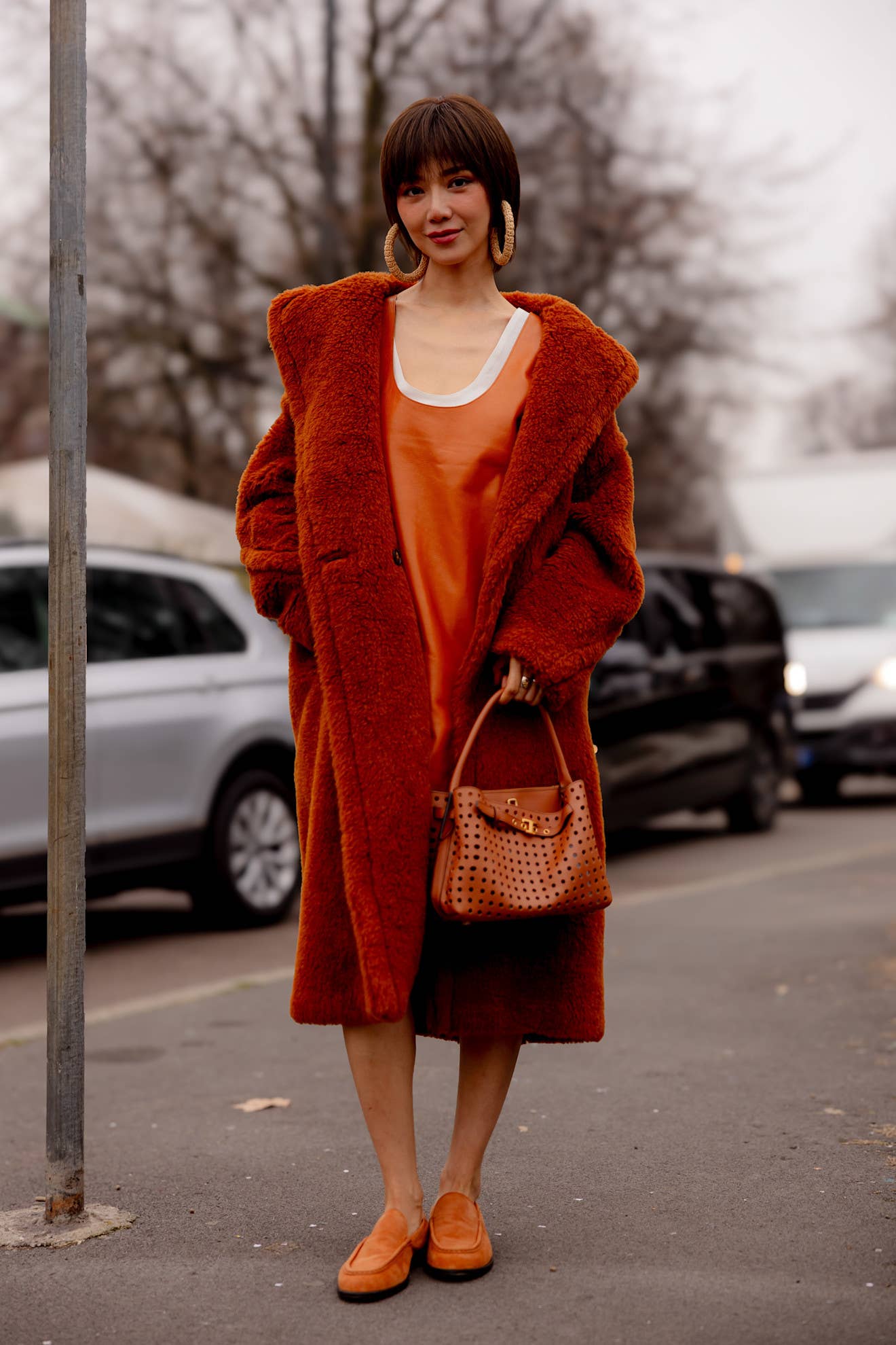 Pops of Orange Brought Levity to Milan Fashion Week Street Style ...
