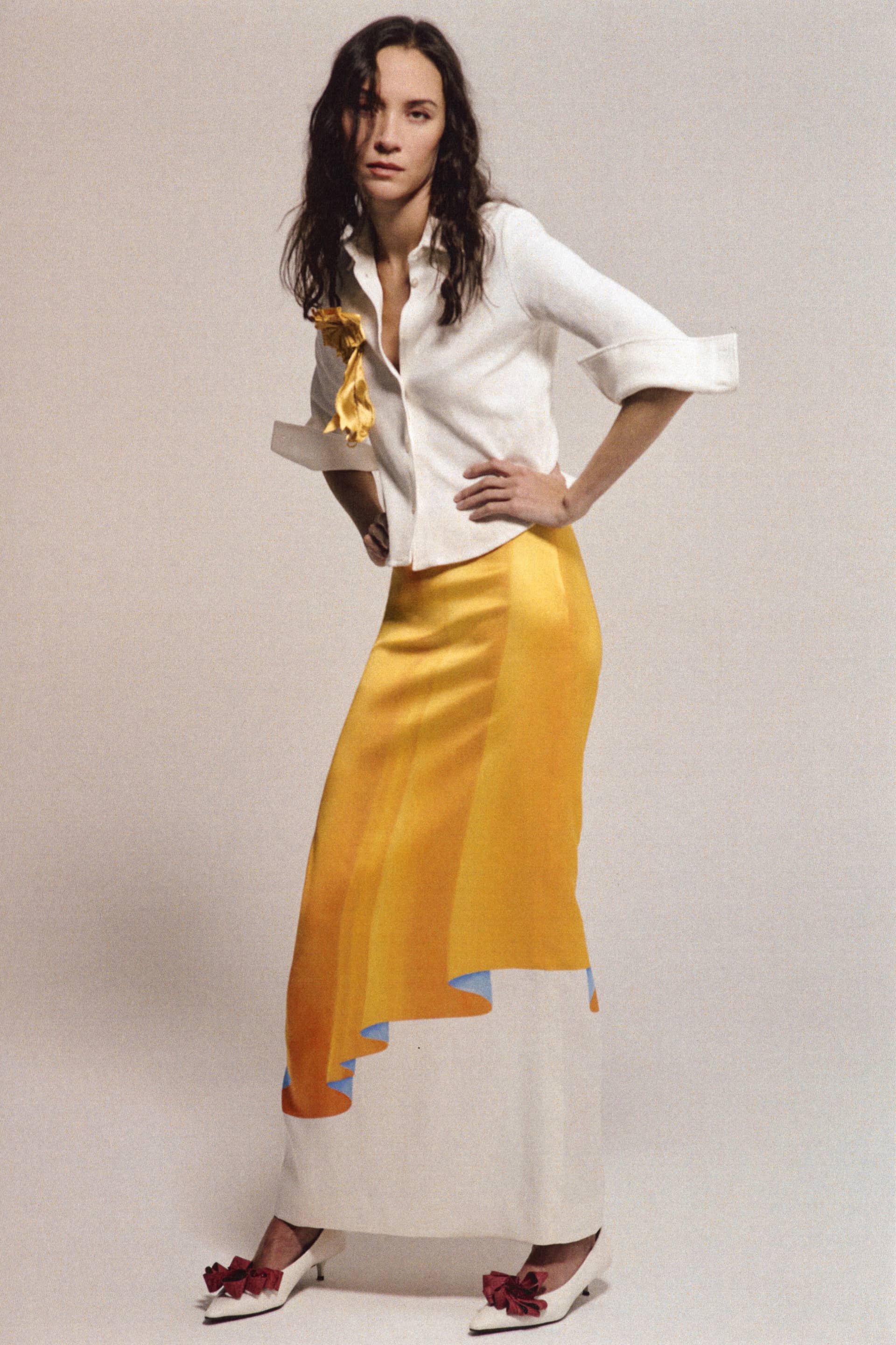 White shirt and yellow skirt from Emily Dawn Long Spring 2027