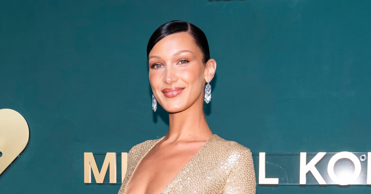 Bella Hadid goes TOPLESS behind massive LV bag for brand campaign