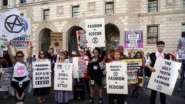 Extinction Rebellion protestors at London Fashion Week.
