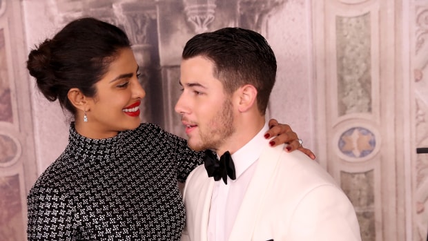 Priyanka Chopra and Nick Jonas attend the Ralph Lauren fashion show during New York Fashion Week