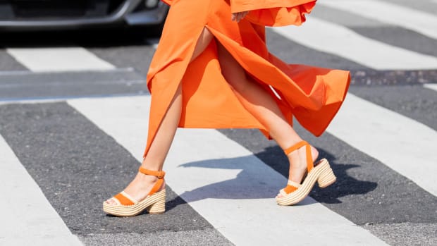 Bettina Looney is seen wearing orange dress outside Mykke Hofmann during Copenhagen Fashion Week Spring:Summer 2020 on August 06, 2019