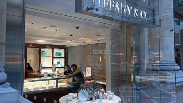 Customers wear a face covering as they shop in Tiffany & Co at The Royal Exchange on April 12, 2021 in London, England.