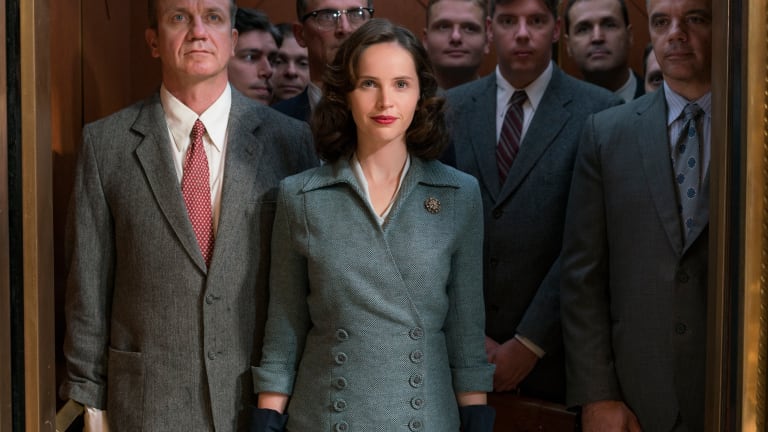 Felicity Jones Wears a Diane Von Furstenberg Wrap Dress and a YSL-Inspired Suit as Ruth Bader Ginsberg in 'On the Basis of Sex'
