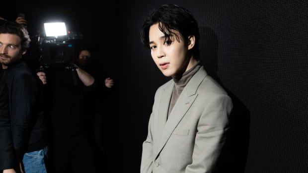 Jimin attends the Dior Homme Menswear Fall-Winter 2023-2024 show as part of Paris Fashion Week on January 20, 2023 in Paris, France