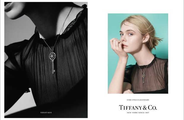 Actress Elle Fanning wears a Tiffany Keys pendant and a Tiffany Metro ri....jpg