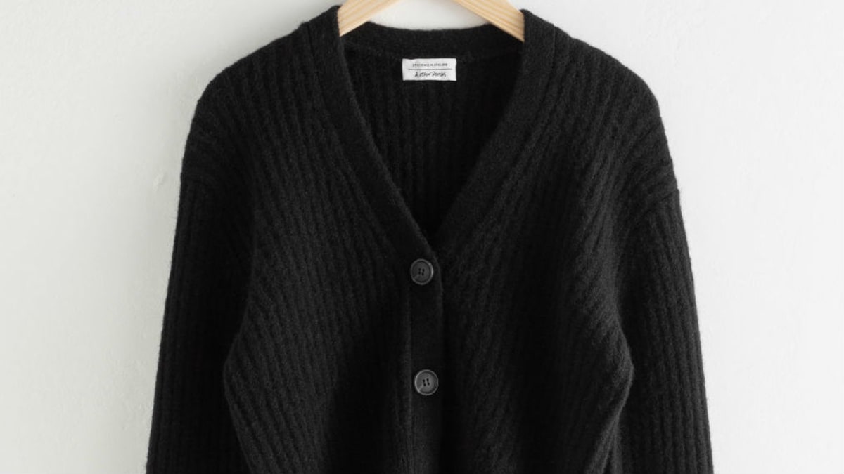 Dhani Is Ready to Stock Up on Cozy Cardigans Like This One Fashionista