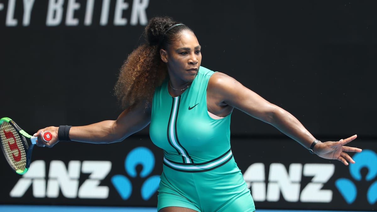 Serena Williams Played Tennis in a Turquoise Leotard and Fishnet Tights Fashionista