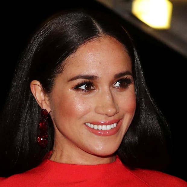 Meghan Markle's White Louis Vuitton Gown Speaks to Her Style Strengths