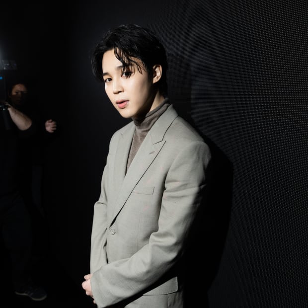 Jimin attends the Dior Homme Menswear Fall-Winter 2023-2024 show as part of Paris Fashion Week on January 20, 2023 in Paris, France