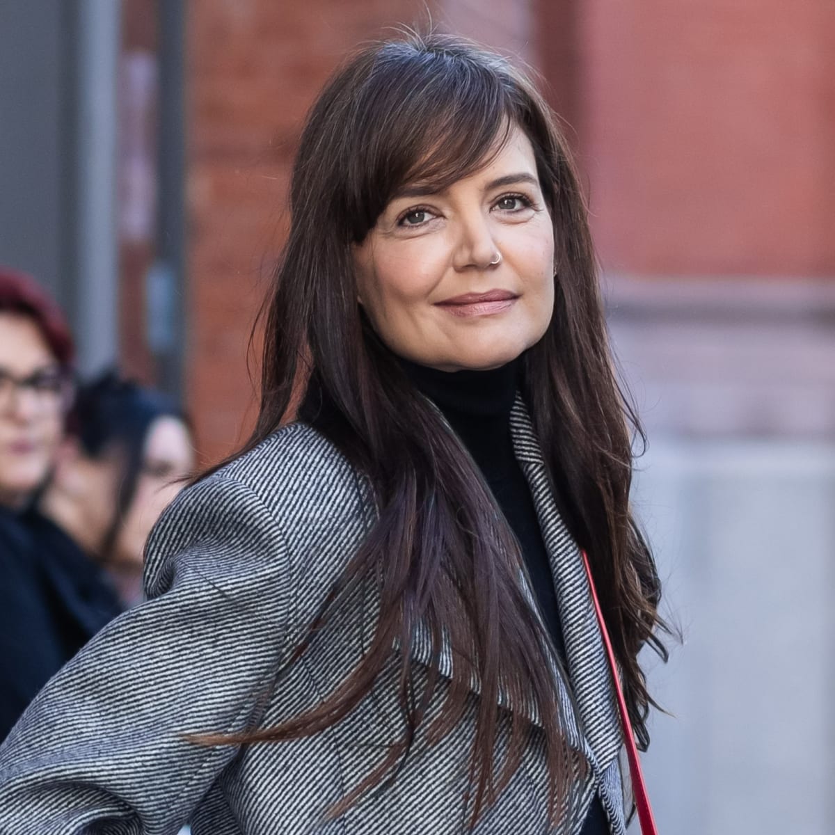 Katie Holmes' Latest Look Will Make You Want Side Bangs and a Red Bag -  Fashionista