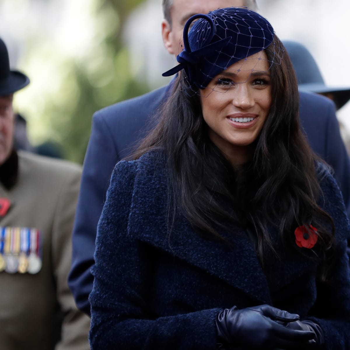 Meghan Markle Wore a Thing Navy Coat and Philip Treacy Hat Edition Fashionista