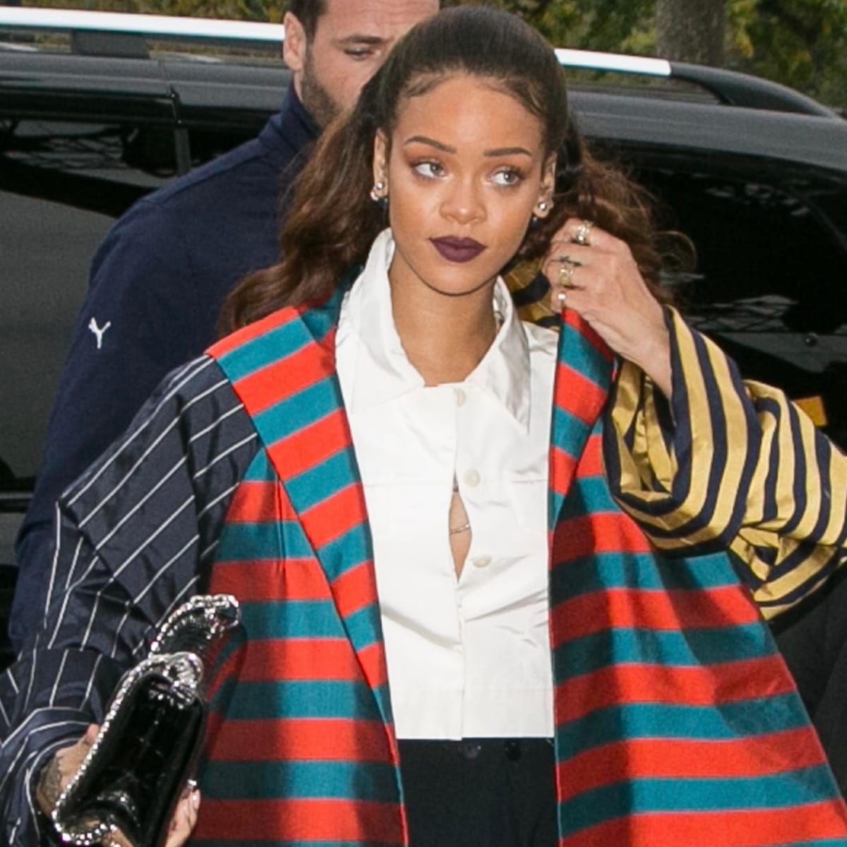 Great Outfits in Fashion History Rihanna s Multi Striped Dior Couture Coat Fashionista