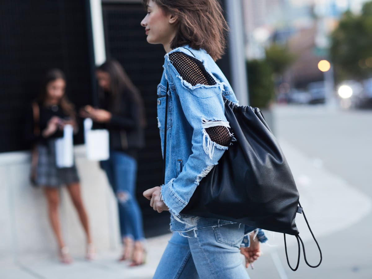 Risqué Aussie denim outfit with dramatic cut outs causes a stir