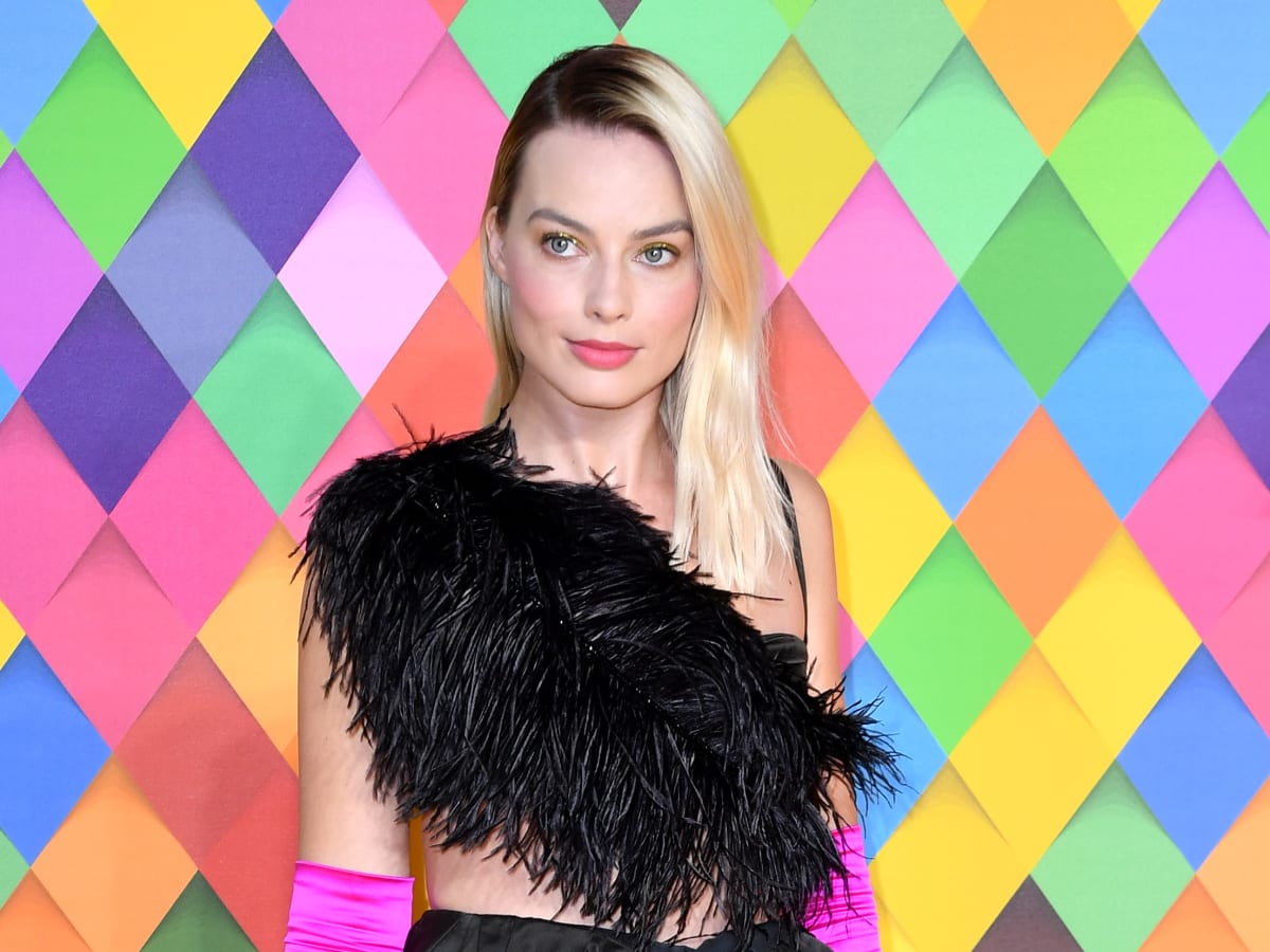 Margot Robbie Can Pull Off Hot Pink Satin Gloves and I Think That's Unfair  - Fashionista