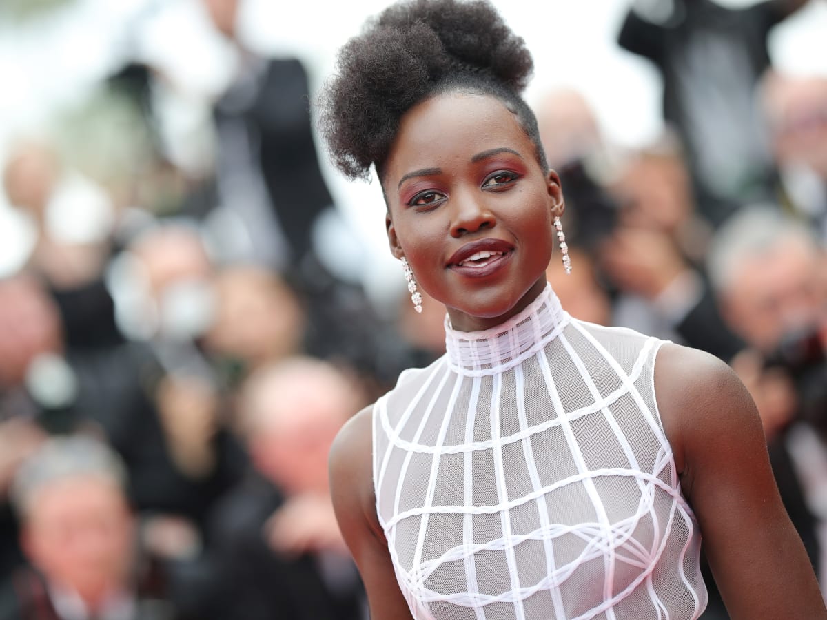 Behind-the-Scenes Look At Lupita Nyong'o's 2022 Oscars Hair and Makeup