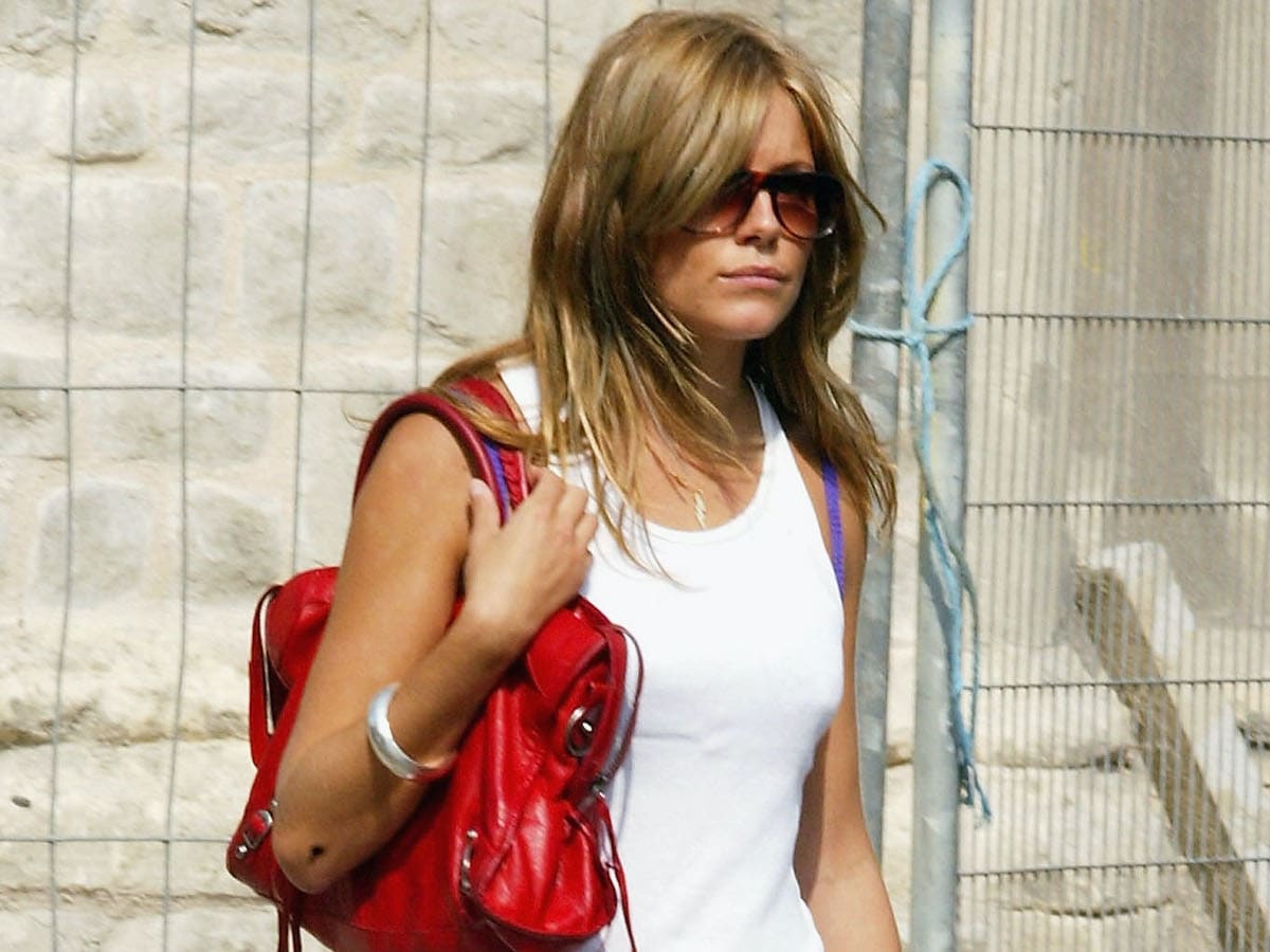 Great Outfits History: Sienna Miller in a Miniskirt, Cowboy Boots and Balenciaga City Bag Fashionista