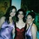 "I wore a silk burgundy dress as I wanted to have a boudoir feel, hence my bra peeking out. As you can see from our semi-coordinated outfits, my friends and I all went for that silk 'negligée' vibe."Photo: courtesy Michelle Copelman (middle)
