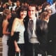"My date, Caroline, looks young and cute. I love that she did separates with a boa and what looks like a really big cameo necklace. She looks a 1990s version of a flapper. I look like a wannabe Backstreet Boy who hasn't yet quit has day job as a butler. Like I am just about to pick up that tray of cheese and crackers in front of me and serve the other prom-goers."Photo: courtesy Brenner Thomas (right)