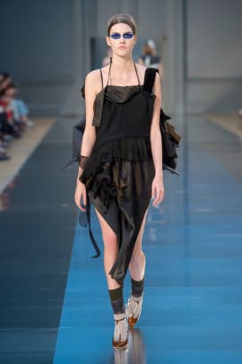 John Galliano Utilizes Burlap and Plastic Wrap For His First