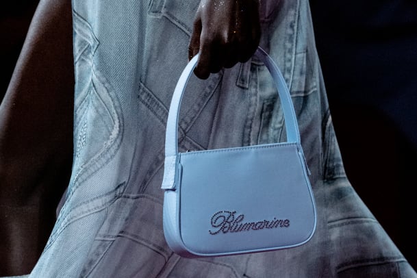 Women in white with Gucci pouch and white Hermes Constance bag before  Trussardi fashion show, Milan Fashion Week street style on September 24,  2017 in Milan. – Stock Editorial Photo © AndreaA. #272169398