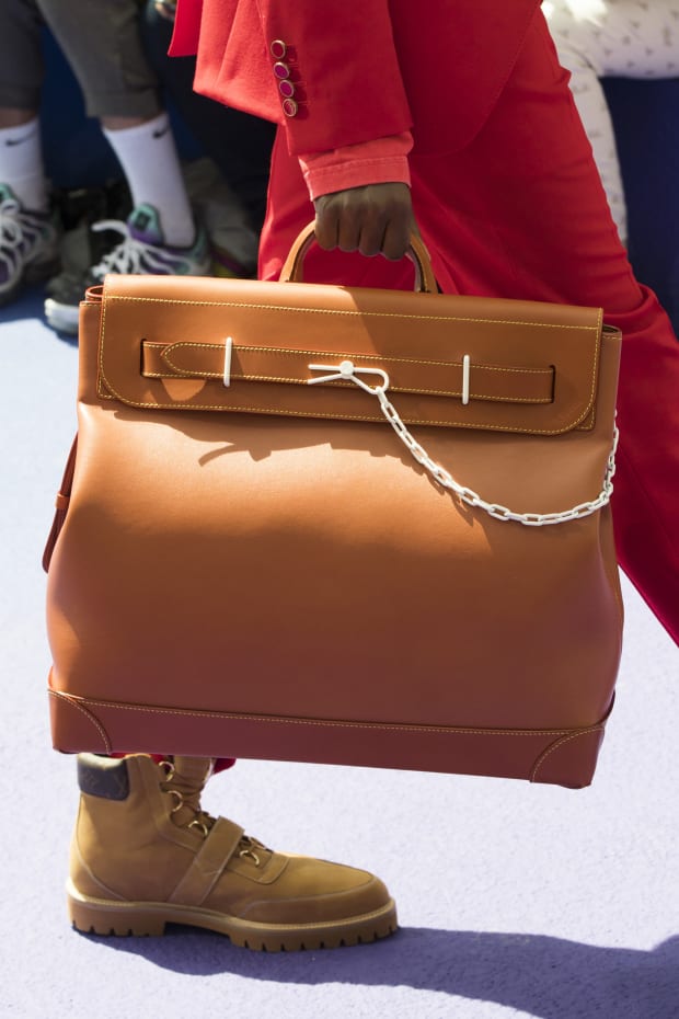 virgilabloh's iridescent @louisvuitton keepall bag could be the hottest  accessory of 2019. Hit the…”