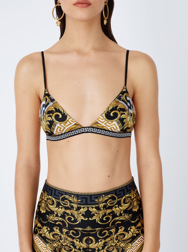 Bella Hadid pairs bikinis with bike shorts in Kith x Versace campaign