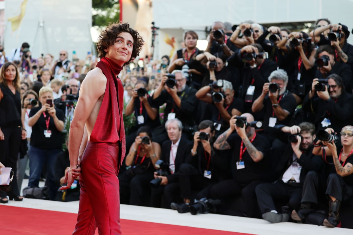Timothée Chalamet Wore a Shimmery Halter Top to the 'Bones And All' Premiere in Venice