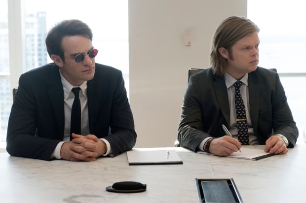 Charlie Cox in his Black Fleece shirt and Paul Smith suit as Matt Murdock and Elden Henson in a funky tie, vintage tie clip and Ted Baker suit as Foggy Nelson. Photo: Barry Wetcher/Netflix, Inc.