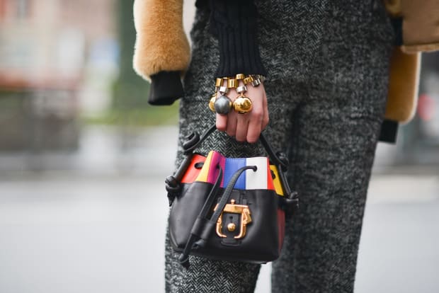 Chiara Capitani poses wearing a JW Anderson jacket, Philosophy jumper and pants and Paula Cademartori bag before the Jil Sander show during the Milan Fashion Week Fall/Winter 2016/17 on February 27, 2016 in Milan, Italy. (Photo by Vanni Bassetti/Getty Images)