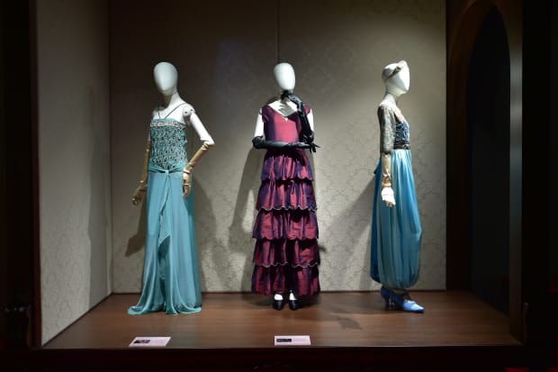 Edith's Criteron dress, Lady Mary's wedding proposal dress and Sybil's harem pants on display during the soft launch in Singapore. Photo: Courtesy