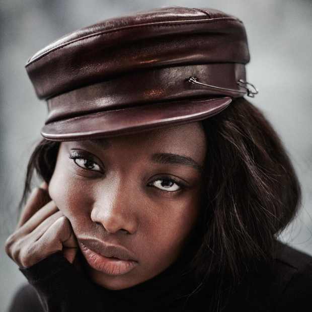 Model Georgie Badiel in the leather Georgie cap, 10 percent of the proceeds of which are donated to her namesake foundation, providing clean water to the people of Burkina Faso. Photo: @gigiburris/Instagram