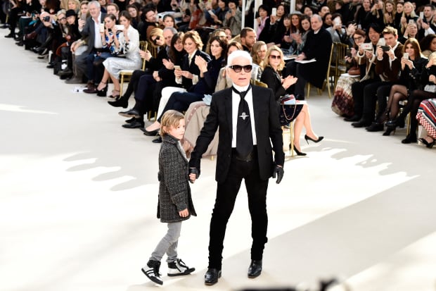 Karl Lagerfeld and his godson Hudson Kroenig at Chanel's Fall 2016 runway show. Photo: Pascal Le Segretain/Getty Images