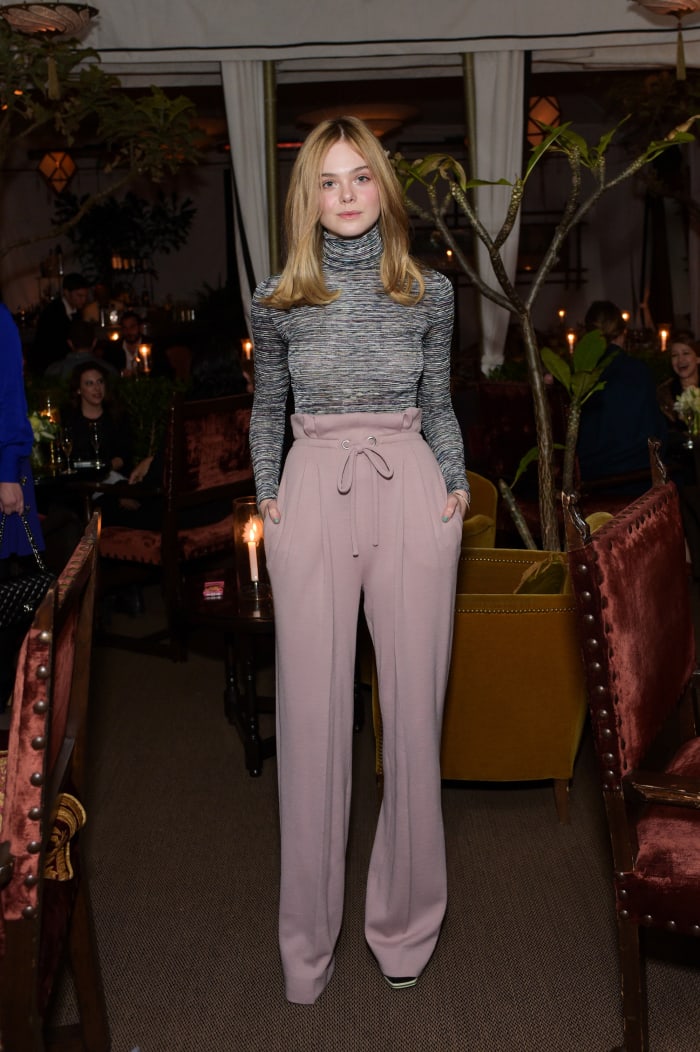 Elle Fanning has legs for days at the Rodarte x Superga Dinner in Los Angeles on Friday. Photo: Stefanie Keenan/WireImage