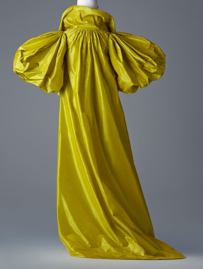 A saffron-colored Oscar de la Renta coat from Annette de la Renta's personal collection, on display in Savannah until May 3. Photo: SCAD