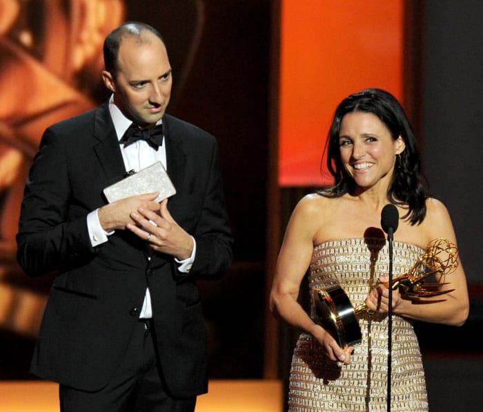 Tony Hale channels his 'Veep' character by holding Julia Louis-Dreyfus' Edie Parker clutch on stage at the Emmy's in 2013. Photo: Kevin Winter/Getty Images
